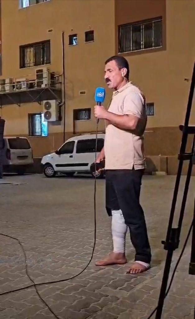 Ibrahim Qanan reports with his leg bandaged.