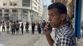 Mohammed Hammo reports from the scene of an Israeli airstrike after being injured in Gaza City on June 27, 2025. 