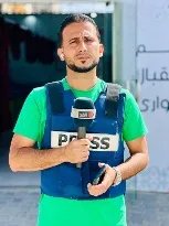 Al-Ghad TV correspondent Mahmoud Omar Al-Louh.