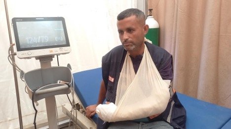 Freelance photographer Mohammed Abu Armana receives treatment for a shrapnel injury on June 9, 2025.