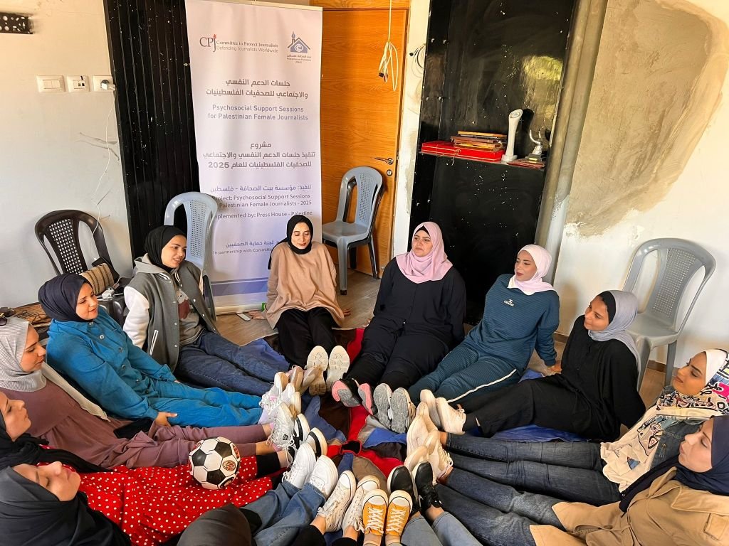 Journalists take part in an exercise during a psychosocial support session implemented by Press House - Palestine. 