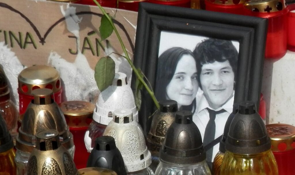 A tribute to the murdered journalist Ján Kuciak and his fiancee Martina Kušnírová. Photo: Ing.Mgr.Jozef Kotulič

				
				
				
				
				The day of Ján Kuciak’s anniversary is still traumatic for this country in the heart of Europe. But neither the president, nor the head of the national parliament, nor the prime minister said a one word about Kuciak nor his fiancée, archaeologist Martina Kušnírová, nor their assassination. In eight years, the prime minister Robert Fico has not once mentioned his name publicly. He mostly talks only about “that journalist” and spreads conspiracy theories and lies about the killing.
I and many others talked about Ján Kuciak on Saturday 21 February 2026, at one of the 30 commemorative demonstrations all around Slovakia. I travelled to Zlaté Moravce about 80 minutes’ drive from capital Bratislava, where local civic activists regularly organise political protests against the populist right-wing government.
I knew Ján personally; I was honoured to host the only public appearance of his very short, but breathtaking career in January 2017. Almost no one knew his name at that time. Where do Slovak millionaires hide their money? was the title of his awesome speech. It was an unforgettable masterclass on innovative data journalism. Ján, an extraordinary talent of his generation, had searched for, read, processed and analysed large public datasets from ministries and government offices to uncover corruption and explain tax frauds and reported on it in his unusually complex stories.
Author Michal Hvorecký speaks to a crowd on the eighth anniversary of Jan Kuciak’s murder. Photo: Milan Illik
In his editorial office, he visualised the collected data in an old-school analogue way drawing with pencils on huge pieces papers spiderwebs of connections full of notorious oligarch names and their criminal networks. He acted as our very first digital-age watchdog. He put the information into context and explained how top members of the governing Party Smer and their sponsors and affiliated post-Soviet style businessmen – many still in power after all these years – stole huge sums and moved the money to tax havens like Cyprus. He also investigated the suspected theft of EU funds destined for eastern Slovakia by the members of Italian mafia.
Ján Kuciak uncovered that the corruption in Slovakia doesn’t only mean petty bribes, but something much deeper and more dangerous – state capture. Corruption as a system. His stories told us how Robert Fico turned democracy into a mechanism for his own enrichment and the power. Party Smer functioned – and unfortunately still does – like a cartel.
Since 2020 we have known how Ján was killed and by whom. But who ordered the assassination? Who wanted to silence him at all costs? We still do not know, and we need to know. Ján exposed a form of corruption so deeply entrenched that it threatened the rule of law and democracy.
Recently, Slovakia’s Special Criminal Court reopened the murder case for the third time. Hopefully, the court will learn from its previous errors and thoroughly examine all the evidence.
To this day, I am convinced that Ján Kuciak could have lived. If the state had acted. If Minister of Interior Robert Kaliňák – today a Minister of Defence – had not laughed at him and refused to demand a police investigation. Ján was openly threatened by influential oligarch and controversial media tycoon Marián Kočner. As a journalist he filed a criminal complaint. It didn’t help. Police refused to assist and protect him. A couple of months later Ján was executed with a single bullet to the heart and Martina with the shot to the head.
Recently, one of the businessman Ján Kuciak was intensively reporting about, Jozef Brhel, founder and sponsor of Smer, was accused of leading an organised criminal group that laundered dirty money from state contracts for years, and in February 2026, he was finally found guilty.
What Ján taught us is to never give up the fight for justice and to speak up about state capture, the most dangerous mutation of corruption. The 21 February is our annual reminder that freedom and the rule of law cannot be taken for granted. Slovakia has a strong civic society ready for widespread protest whenever necessary, and a free critical media, both also thanks to Ján. Good writing can still change the world and make it a better place, as his major work, published posthumously, proved.
“One day, Slovakia will wake up,” Ján wrote. I hope this day is very near.

			
			
					
				
				
				
				READ MORE