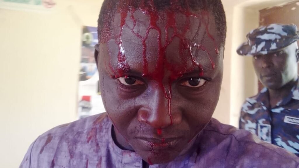 Nigerian police beat journalist Muhammad Sani Adamu during Eid celebrations