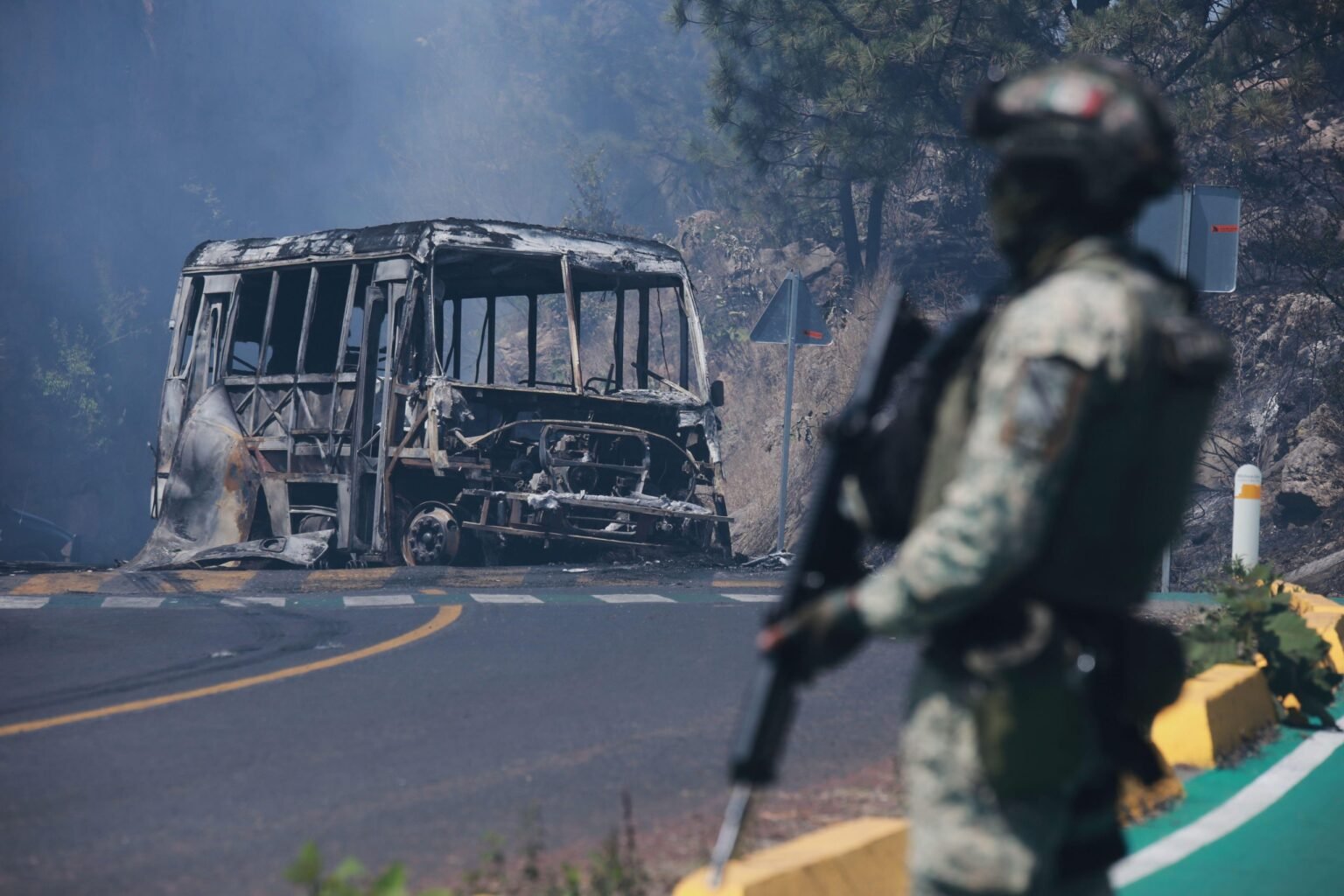 A soldier stands guard by a charred vehicle after it was set on fire, in Cointzio, Mexico, Feb. 22, 2026, following the death of the leader of the Jalisco New Generation Cartel, Nemesio Oseguera, known as “El Mencho.” Photo by: AP Photo/Armando Solis, File

				
				
				
				
				When I heard the horrifying news of tourists being shot at the Teotihuacán pyramids in Mexico (one Canadian woman was killed), I was struck by a detail – the number of people who wished to remain anonymous when interviewed by the media. I probably shouldn’t have been surprised. For years Mexico was the deadliest place to be a journalist – the media caught between murderous cartels and corrupt officials. The country no longer occupies the number one spot (that goes to Gaza where 53 press members were killed in 2025), but it’s still an incredibly dangerous place to be a reporter. Between October 2024 and October 2025 10 journalists were killed. All of which impacts people’s willingness to go on the record.
The journalists’ killings are part of a wider context of extreme violence in Mexico, laid bare two months ago when masked gunmen from the Jalisco New Generation Cartel went on a rampage to avenge the killing of their leader “El Mencho” by security forces. Yes, the Teotihuacán pyramids’ attack seems to have been carried out by a lone assailant with no apparent links to cartels. But violence begets violence – the backdrop counts.
The current Mexican president, Claudia Sheinbaum, has condemned the attack on tourists and called for a thorough investigation. Will that happen in a meaningful way? The jury is out. Sheinbaum is not her predecessor when it comes to freedom of expression (Andrés Manuel López Obrador was actually crowned our Tyrant of the Year in 2022 due to his hostility to the media; Sheinbaum is slightly better here). Both leaders though have in different ways struggled to fully confront and discuss the country’s violence. Sheinbaum says the problem is getting better, citing declining murder rates. Others dispute this, pointing to things like the growing numbers of forced disappearances, which don’t count as murder. Obrador did the same. He proclaimed femicide figures had dropped under his leadership, except he narrowed the reporting period to the lowest point, ignoring the time when the numbers rose under him. Anyone who highlighted this was derided as an enemy of Mexico (as we reported in 2023).
It’s easy to understand why both leaders would want to downplay the violence – it’s hardly a great look politically, nor does it position Mexico as a “top holiday destination”. And with Mexico hosting the World Cup in June, it’s an extra-sensitive moment. Sadly such tactics don’t stop the realities on the ground. The opposite in fact – they feed into the climate of impunity, where ordinary people are so intimidated they are reluctant to bear witness, even to random attacks, for fear of becoming victims of violence themselves.

			
			
					
				
				
				
				READ MORE