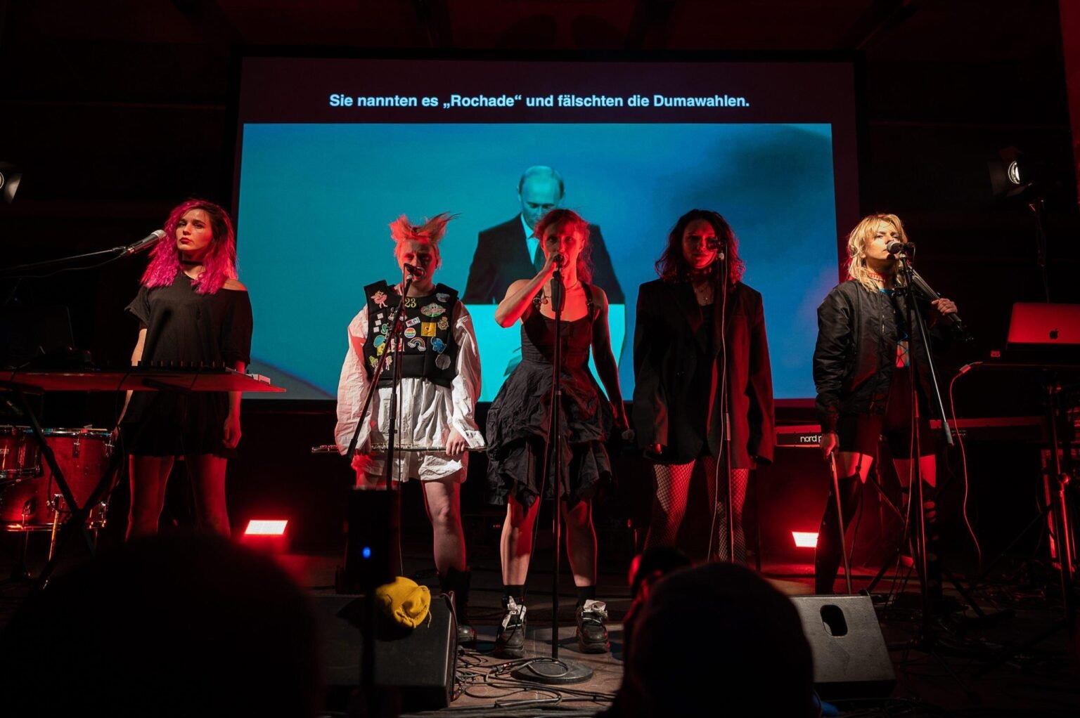 From left to right, Diana Burkot, Taso Pletner, Mariya Vladimirovna Alyokhina, Olga Borisova and Alina Petrova, members of Pussy Riot at the Neisse Film Festival in Görlitz, Germany. Photo: Paul Glaser/dpa/Alamy

				
				
				
				
				This article first appeared in the Spring 2026 issue of Index on Censorship, The monster unleashed: How Hungary’s illliberal vision is seducing the Western world published on 2 April 2026. 
Three years ago, I moved to Britain from my native Russia. Ten years ago, I became a member of the feminist protest and performance art group Pussy Riot.
But before all that, you may be surprised to learn I was a policewoman.
“Scram, quick, from here on in it only gets worse.” I heard that sort of thing a lot at the age of 18, after I started working for the Police Patrol and Checkpoint Service in St Petersburg.
How did my colleagues, who had worked in the system all their lives, see me? “This young chick breezed in, wearing nail extensions and a pink puffer jacket.” How did I see myself? Inspired by the TV series Dexter, I made believe that I was Debra Morgan – a real tough cookie who kicked bad-guy butt. I wanted to be like that.
When they asked me why I’d decided to “throw my life away on policing junkies and alcoholics, instead of just joining them”, I talked about justice. About protecting the public. About helping people. They answered me with a condescending pat on the shoulder. “An innocent kid,” they said.
I joined an outfit that was 80% men. The older ones played at “fathers” with me and the young ones worked on polishing their pick-up skills. Dirty jokes and misogyny were the norm. If you felt uncomfortable with that, then you were in the wrong place.
I became a junior sergeant, with two gold stripes on my shoulders. It seemed to me that a representative of authority should have an aura of sternness, but I didn’t have any. “Olya, you’re a cop. You’re a cop,” I used to repeat to myself. And, thanks to my theatrical past, it worked. “You are now committing a civil offence,” I would declare with supreme confidence as I approached yet another group of people drinking beer outside a metro station.
You come to realise that you have a right to make demands. A right to arrest people. You represent power. The very moment when you put on your uniform and start feeling your power is when your professional deformation begins. Setting aside your own existential suffering, helping those who genuinely need your help really does bring a sense of satisfaction.
But everything that this system is built on is wrong. The reforms of the noughties didn’t actually change anything. The militia became the police and the uniform changed colour from grey to navy blue, while the bureaucracy increased and remained in the hands of people with the same old worldview, who still exploit it every day to further their own interests.
Borisova’s official police photo
One day, after the usual “standard check”, our unit commander started finding fault with my employment record book. He claimed that I’d pulled the thread out of it myself, which was absolute nonsense – I’d simply been issued with one like that. And that wasn’t the first time he’d suddenly accused me of something. When he left, I walked under an archway with one of my colleagues and cried, because I couldn’t understand why the commander was treating me like that. You’ve probably never seen cops cry.
More and more often I caught myself thinking that the one thing I was most afraid of in this life was becoming like them: hard-boiled cynics, discontented and envious. Or like my poor colleague, who never took bribes: a wretched whipping-boy, standing there soaked-through in the rain. As I snivelled under that archway, trying to light a slim cigarette with trembling fingers, my partner advised me simply to tough it out until our commander turned his attention to someone else.
That answer didn’t satisfy me back then, at the age of 19. And now I understand that the real problem wasn’t that I was a girl. That causes more problems – you have to stand up for yourself – but it isn’t the root cause of everything. The real problem is the chain of power and coercion. You just put up with it all until eventually you rise high enough for the roles to be reversed.
Another year would go by before I left the police. When I arrived at the base to collect my things, my unit commander – the same man who had kept picking on me, the same man who had got drunk, lost all his personal documents, including his police ID card, and ended up in a car crash – told me condescendingly: “Well now, Olya, I always knew this wasn’t your thing.”
Only a few months later I would join my first demonstration. And my first protest was also an act of mourning. Politician Boris Nemtsov had been murdered only metres away from the Kremlin. He had been critical of President Vladimir Putin’s provocative aggression against Ukraine. He had been the voice of Russians who opposed war, a charismatic individual about whom I knew almost nothing. But when I saw on Twitter that this opposition politician had been shot in the centre of Moscow, I couldn’t simply stop there.
I started avidly reading everything about the opposition movement in Russia. While I was gathering my documents to join the police, Pussy Riot were beaten with whips by Cossacks in Sochi. While I was trying to prove to myself that I could be a good cop, people in Russia were protesting against Putin. The number of political prisoners grew, new repressive laws were passed, opposition leader Alexei Navalny’s websites were blocked. I learned about a huge community that fought against injustice, cast light on the trials of artists, put together aid parcels for people who were arrested, organised protest demonstrations and wanted a different future for Russia.
The resounding slogans “Russia without Putin!” and “Freedom for political prisoners” hung in the air everywhere; they swept right round the cities of Russia. And I really liked that. I became an activist.
At the age of 21, I moved to Moscow, enthralled by the idea of doing something important together with people who thought the same way I did. I devoured news and history. I read about the war in Chechnya, about murdered civil rights activists, about terrorist attacks, about how they were starting to extinguish freedom of speech. The more I read, the more obvious it became that these tragic events are not isolated instances. They’re interconnected. This understanding gave me a strange feeling of firm ground under my feet. It didn’t make me physically stronger but it gave me a definite stance: I have the right to make a political statement.
I started working with political prisoners. We provided legal aid and told them about the new political trials every day. It’s impossible not to burn out doing this kind of work – reading about torture in the prison camps, talking to the relatives of people jailed for posts on Facebook. By the time you’ve helped one, they’ve arrested another six.
They say growing up means accepting the fact that the world is unjust. That injustice is part of the order of things. And the longer you resist, the more painful your fall will be. But you’re bound to fall anyway. The world is unjust, but that doesn’t mean you shouldn’t listen to your own heart.
Five years went by like this. I carried on going to meetings and taking part in protests. I saw someone receiving a suspended sentence for disagreeing with the authorities as a victory or a miracle. Would you be prepared to sacrifice five years of your life for a post on the internet? More and more people left the country.
The West introduced sanctions against Russia following the annexation of Crimea, but people in Europe carried on shaking Putin’s hand while in Crimea activists were being abducted. “We are deeply concerned.” Thank you.
The 2018 World Cup was held in Russia. Not a single European country boycotted it. That same summer, in the Central African Republic, the forces of “Putin’s chef”, Yevgeny Prigozhin, killed a group of Russian journalists who went there to shoot a documentary about Putin’s interests in Africa.
Two months later, my friend Petya Verzilov was poisoned with military nerve gas. Because he had spoiled Putin’s party by organising a protest in which he and other members of Pussy Riot ran on to the pitch during the final of the World Cup, or because he was due to fly out to the Central African Republic? I don’t know.
But understanding the non-random nature of the chain of tragic events no longer provided me with a firm footing. I started envying people who weren’t interested in that. “After all, you could simply live a normal life. What can you change?” my mother said.
Two years later, Navalny was poisoned with a similar toxin. It was a miracle he survived.
Peering into the future of my country was more frightening than any movie.
Putin started bombing Ukraine. A war began. No, that’s wrong… My country started a war. People in Kyiv slept in the metro stations with their nursing infants. Russian soldiers shot people in Bucha. Mariupol was almost totally destroyed. This was very painful and terrifying. I didn’t know how to stop it.
This is how Maria Alekhina and I described it in the book we wrote, Political Girl:
“Paralysis. Numbness. Fear. Numbness. Pain. Numbness. What are you called, devils? We’re called words you didn’t know before. We’re called missile strike, we’re called shelter. We are called the army of the fucking Russian Federation.”
All these years we’d been saying that Putin wouldn’t stop unless we knocked him back hard. I had to accept in my heart that the point we had reached now meant this was impossible.
Like many of my friends, I left the country. I bought a one-way ticket to Georgia. I didn’t have a plan but a plan found me. My friend Masha from Pussy Riot called me. She invited me to join an anti-war tour around Europe, where we would collect money for a Ukrainian hospital. At that moment she was under house arrest in Moscow, facing her second criminal charge. But she dressed up in the green uniform of a food delivery girl, escaped from the house that was surrounded by cops and got across the border.
For almost three years we performed our show Riot Days – four girls in a van without any official ID, without a plan, without a home. But the shared goal of doing at least something useful before our country slithered down into fascism justified our existence.
For more than two years now I’ve been glancing out of the window, trying to imbibe someone else’s sense of home. During the first year of the war there was still the casual attitude of “Well, we don’t know when it will end. Maybe the war will be over in a month”. But the moment arrived when I realised that what was happening in Russia couldn’t be ended with the signing of some document or other. That we have no future as a society if we don’t serve penance for this war, if we don’t help to restore everything that we have destroyed, if we don’t give back what we tried to seize by force.
I miss my home, my parents, my friends. I remember the feel of everything in my flat. I can close my eyes and touch the tablecloth on the table in the living room, feel the coldness of the door handle in my room.
In today’s Russia, to be against the war is a crime. I can’t go back home. Last year, I was sentenced in my absence to eight years in prison. If I had killed someone and I had enough money for a good lawyer, I’d probably have been given a shorter sentence.
My native country is preserved in my memory as a mosaic of doors, traffic lights on familiar streets, tastes, bus stops, songs and smells. When I see blogs with streets that I know, I gaze at them for a long time, as if I’m peering through a little window at another planet I can never go to. I try not to romanticise things. The bottom line is that my country chewed me up and spat me out.
The world is unjust, it’s true. But that doesn’t absolve you from the need to make a choice. I don’t regret a single decision I’ve made. I’m at liberty. I don’t have to engage in self-censorship. I can carry on working and speaking out. It’s not a matter of victory. I haven’t won any victory. But I didn’t submit, and that is enough.
Translated from Russian by Andrew Bromfield

			
			
					
				
				
				
				READ MORE