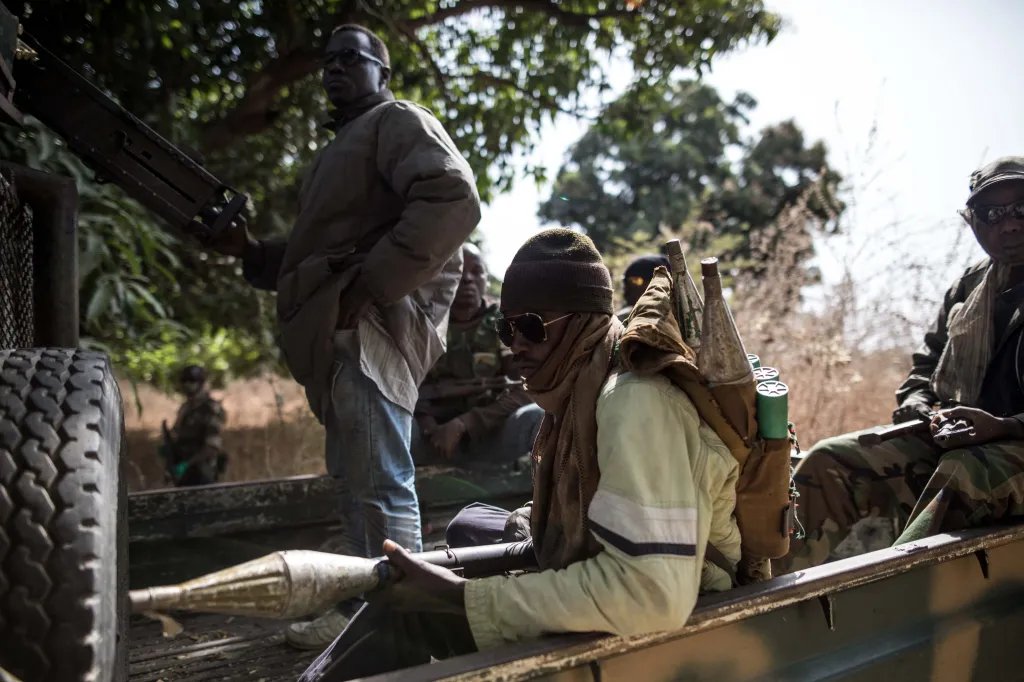 Separatists belonging to the Movement of Democratic Forces of Casamance (MFDC) arrive ahead of the release of seven captured Senegalese soldiers at an abandoned settlement, Baipal in Gambia on February 14, 2022. Separatist rebels from Senegal's southern Casamance region on Monday handed over seven Senegalese soldiers whom they had captured three weeks ago, AFP reporters saw, demanding nothing in return.