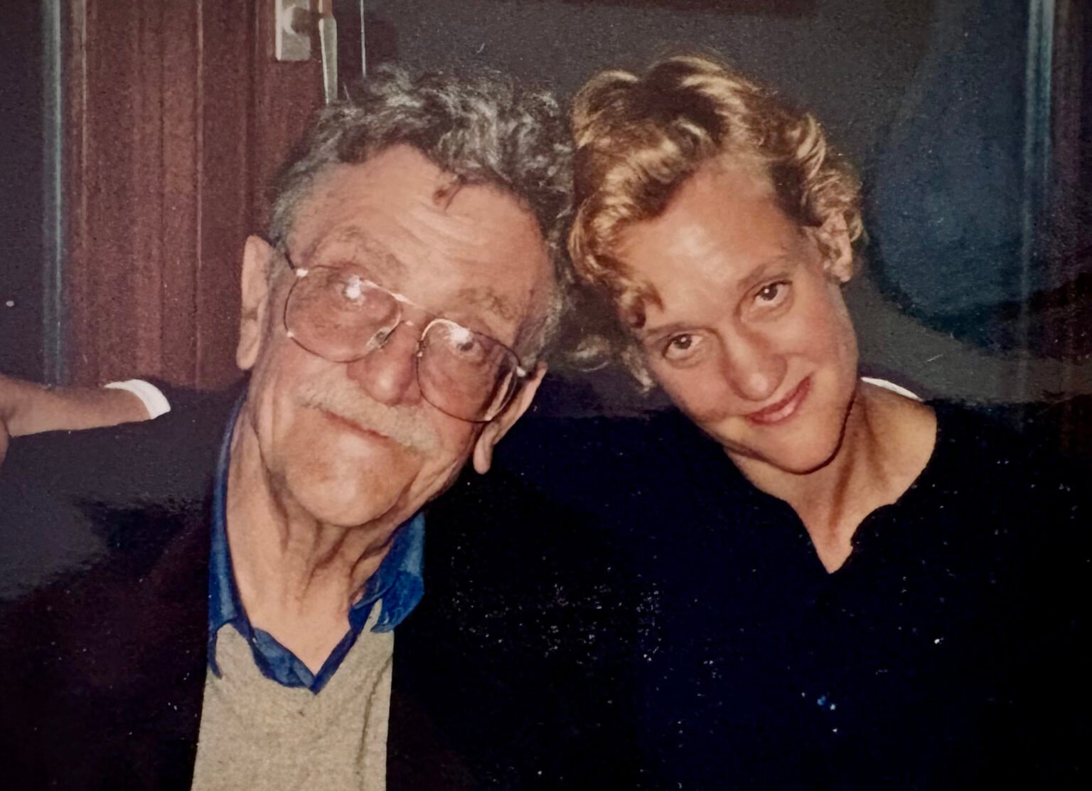 Kurt Vonnegut and his daughter Nanette in 1997. Photo: Family handout
This article first appeared in the Spring 2026 issue of Index on Censorship, The monster unleashed: How Hungary’s illliberal vision is seducing the Western world published on 2 April 2026.
“My mother warned me early on that my father was going to get in trouble for writing dirty books.”
Nanette Vonnegut, youngest daughter of the late American novelist Kurt Vonnegut, remembers these words vividly. Even though she was around eight years old at the time, she recognised the real fear in her mother’s voice. At the time, she didn’t quite know what to do with the warning. But through a serendipitous encounter, she now has a much better idea.
When she was invited, along with her brother, to represent the Vonnegut Estate at a meeting about book censorship hosted by publisher Penguin Random House, she had what she describes as a conversion experience. Now, she is taking on the State of Utah alongside other plaintiffs, in a case defending the freedom to read, filed by the American Civil Liberties Union (ACLU) of Utah Foundation.
“I was blown away by the urgency,” she told Index, recalling the passion and bravery of the librarians and lawyers who spoke at the meeting. Each person took their turn to make a speech, “like one sermon after another”. Vonnegut spoke about her own childhood memories, when she was afraid of what might happen to her father.
One speaker in particular, she remembered, described how book bans in the USA are not about words or even sex, but about ideas.
“Not until now, did I ever feel afraid for what’s going on. These books in Utah are being thrown away. They’re just pulled off the shelves,” Vonnegut said. But this, she added, has always been a lurking threat.
No sex please, we’re prudish
At the meeting, she discovered that in Utah, any mention of sex in a book was sufficient reason for it to be pulled from any school library in the state. Kurt Vonnegut’s Slaughterhouse-Five, an anti-war novel first published in 1969, remains hugely controversial; it has already been banned in two school districts in Utah, labelled as pornographic. If the book is successfully challenged in a third district, the ban automatically becomes state-wide, as has already happened with 28 other books. Nanette Vonnegut can’t recall the book being particularly pornographic in nature.
Interviewed on National Public Radio, Terry Hutchinson, a former member of a Utah schoolboard, said: “I am not a big Kurt Vonnegut fan. Not really because of subject matter, but because of style.” He believed that Slaughterhouse-Five should be removed from school libraries. For him, the book crossed the line when a character gets an erection.
When Vonnegut and her attorney Tom Ford were invited to discuss the lawsuit on WHMP Radio, Ford explained that Utah’s book removal law, HB29 (passed in 2022 and amended in 2024), prohibits public school libraries from carrying any book that contains a description of a sex act. In Vonnegut v. Utah, the plaintiffs will argue that sections of HB29 are overbroad and in violation of First Amendment rights.
“It prohibits a remarkably sweeping range of literature from every school library in the state,” Ford told the radio station. Appropriate age categories are irrelevant where this law is concerned – all sex is bad sex.
The law itself, Ford said, springs from the false narrative created by conservative lawmakers in Utah that the state’s school libraries were full of pornographic books. In fact, Ford continued, the real targets of this censorship were ideas, messages and lived experiences.
The earliest memory Vonnegut has of her father being a target of literary censorship is not one of quiet removal from a library shelf, but rather something more dramatic. In 1973, a school in Drake, North Dakota threw copies of Slaughterhouse-Five into its furnace. The books were burnt on the orders of the local school board, which had deemed the novel “profane”. Ironically, Vonnegut’s novel was inspired by his experiences as a prisoner of war in Germany during the Second World War. Before the war the Nazis had organised public burnings of books that they deemed “un-German”. Kurt Vonnegut wrote a letter to the school in response.
“You can feel his rage and his hurt,” his daughter told Index, recalling the letter.
Putting the Vonnegut name to good use
Now, she said, she can’t believe that book banning is back in the USA, and “worse than ever”. She fears for the teenagers who don’t have access to the right resources and how much trouble it’s going to leave them in. For the first time, she feels she can really put her Vonnegut name to good use.
Nanette Vonnegut grew up in a creative household, with her mother guarding the door to protect her father’s writing space. “You were scared of that door, because you knew that he was he was trying to write.” He worked hard, she remembered, all the time, and there was a sense that it was serious work.
She described to Index how her father would come out from his writing for a snack (usually pumpernickel loaded with butter). The kitchen would be full of the kids and their friends, but he’d barely register them. Often, he would be muttering to himself; sometimes, he’d stop and talk to his youngest daughter, verbally working through an idea. Once, on his way back to his study, he paused and said to her: “You know, the unstructured life is not worth living.”
Kurt rarely left the house. His wife, Jane Marie Cox, maintained the family’s social front by doing all the expected things like going to cocktail parties and playing tennis. She was his biggest supporter. Cox was passionate about reading too, and the Vonnegut house was always full of books. At the end of each day, the couple would discuss Vonnegut’s day of writing.
“She was like his editor,” Nanette said, describing how when it came to stories, “she was the midwife.”
A Vonnegut family trip Niagara Falls circa 1964. Photo: Family handout
Memories of Slaughterhouse-Five
Her father, she explained, was always writing to tell the truth. Slaughterhouse-Five was a particular challenge, because he struggled to get the information he needed about the fire-bombing of Dresden, which he had experienced. When he did finally finish the book, he left the galleys out for the children to read. When it was published, he became an overnight sensation.
It was a writer’s house, and as the children got older, it became a party house too. According to Nanette Vonnegut, “It was a very heady, exciting time.”
Her parents often had other creatives over at the Vonnegut home. Once, it was actor and director Peter Fonda, to talk about film rights for Vonnegut’s book Cat’s Cradle. Jack Kerouac, author of On The Road, visited before he was famous. After having a little too much to drink, his bad language ramped up. Nanette and a friend, aged around nine, were told to leave the room and go upstairs.
“But we did not go upstairs,” she recalled. “We stayed behind the door. It was sort of thrilling and exciting. He was like a wild man, and he seemed to be a lot of fun. We didn’t want to miss any of it.”
Growing up in this household, she internalised a strong faith in the creative process. She has inherited this “creative groove” as an artist. Take, for example, the day she snapped, for no particular reason, a photo of the Senate floor being shown on a television screen. A few days later, on 6 January 2021, came the US Capitol riot. Following her creativity, Vonnegut created a huge six-foot painting (opposite) from the photograph.
Although mostly found in her art studio, Vonnegut feels a strong sense of the power of words, and is a writer too.
“Words are the most sacred things that we have, and that’s something I grew up with,” she told Index. And above all, evident in her fight against Utah, she has always taken for granted the belief that there are no “dirty words”.
READ MORE Kurt Vonnegut and his daughter Nanette in 1997. Photo: Family handout
This article first appeared in the Spring 2026 issue of Index on Censorship, The monster unleashed: How Hungary’s illliberal vision is seducing the Western world published on 2 April 2026.
“My mother warned me early on that my father was going to get in trouble for writing dirty books.”
Nanette Vonnegut, youngest daughter of the late American novelist Kurt Vonnegut, remembers these words vividly. Even though she was around eight years old at the time, she recognised the real fear in her mother’s voice. At the time, she didn’t quite know what to do with the warning. But through a serendipitous encounter, she now has a much better idea.
When she was invited, along with her brother, to represent the Vonnegut Estate at a meeting about book censorship hosted by publisher Penguin Random House, she had what she describes as a conversion experience. Now, she is taking on the State of Utah alongside other plaintiffs, in a case defending the freedom to read, filed by the American Civil Liberties Union (ACLU) of Utah Foundation.
“I was blown away by the urgency,” she told Index, recalling the passion and bravery of the librarians and lawyers who spoke at the meeting. Each person took their turn to make a speech, “like one sermon after another”. Vonnegut spoke about her own childhood memories, when she was afraid of what might happen to her father.
One speaker in particular, she remembered, described how book bans in the USA are not about words or even sex, but about ideas.
“Not until now, did I ever feel afraid for what’s going on. These books in Utah are being thrown away. They’re just pulled off the shelves,” Vonnegut said. But this, she added, has always been a lurking threat.
No sex please, we’re prudish
At the meeting, she discovered that in Utah, any mention of sex in a book was sufficient reason for it to be pulled from any school library in the state. Kurt Vonnegut’s Slaughterhouse-Five, an anti-war novel first published in 1969, remains hugely controversial; it has already been banned in two school districts in Utah, labelled as pornographic. If the book is successfully challenged in a third district, the ban automatically becomes state-wide, as has already happened with 28 other books. Nanette Vonnegut can’t recall the book being particularly pornographic in nature.
Interviewed on National Public Radio, Terry Hutchinson, a former member of a Utah schoolboard, said: “I am not a big Kurt Vonnegut fan. Not really because of subject matter, but because of style.” He believed that Slaughterhouse-Five should be removed from school libraries. For him, the book crossed the line when a character gets an erection.
When Vonnegut and her attorney Tom Ford were invited to discuss the lawsuit on WHMP Radio, Ford explained that Utah’s book removal law, HB29 (passed in 2022 and amended in 2024), prohibits public school libraries from carrying any book that contains a description of a sex act. In Vonnegut v. Utah, the plaintiffs will argue that sections of HB29 are overbroad and in violation of First Amendment rights.
“It prohibits a remarkably sweeping range of literature from every school library in the state,” Ford told the radio station. Appropriate age categories are irrelevant where this law is concerned – all sex is bad sex.
The law itself, Ford said, springs from the false narrative created by conservative lawmakers in Utah that the state’s school libraries were full of pornographic books. In fact, Ford continued, the real targets of this censorship were ideas, messages and lived experiences.
The earliest memory Vonnegut has of her father being a target of literary censorship is not one of quiet removal from a library shelf, but rather something more dramatic. In 1973, a school in Drake, North Dakota threw copies of Slaughterhouse-Five into its furnace. The books were burnt on the orders of the local school board, which had deemed the novel “profane”. Ironically, Vonnegut’s novel was inspired by his experiences as a prisoner of war in Germany during the Second World War. Before the war the Nazis had organised public burnings of books that they deemed “un-German”. Kurt Vonnegut wrote a letter to the school in response.
“You can feel his rage and his hurt,” his daughter told Index, recalling the letter.
Putting the Vonnegut name to good use
Now, she said, she can’t believe that book banning is back in the USA, and “worse than ever”. She fears for the teenagers who don’t have access to the right resources and how much trouble it’s going to leave them in. For the first time, she feels she can really put her Vonnegut name to good use.
Nanette Vonnegut grew up in a creative household, with her mother guarding the door to protect her father’s writing space. “You were scared of that door, because you knew that he was he was trying to write.” He worked hard, she remembered, all the time, and there was a sense that it was serious work.
She described to Index how her father would come out from his writing for a snack (usually pumpernickel loaded with butter). The kitchen would be full of the kids and their friends, but he’d barely register them. Often, he would be muttering to himself; sometimes, he’d stop and talk to his youngest daughter, verbally working through an idea. Once, on his way back to his study, he paused and said to her: “You know, the unstructured life is not worth living.”
Kurt rarely left the house. His wife, Jane Marie Cox, maintained the family’s social front by doing all the expected things like going to cocktail parties and playing tennis. She was his biggest supporter. Cox was passionate about reading too, and the Vonnegut house was always full of books. At the end of each day, the couple would discuss Vonnegut’s day of writing.
“She was like his editor,” Nanette said, describing how when it came to stories, “she was the midwife.”
A Vonnegut family trip Niagara Falls circa 1964. Photo: Family handout
Memories of Slaughterhouse-Five
Her father, she explained, was always writing to tell the truth. Slaughterhouse-Five was a particular challenge, because he struggled to get the information he needed about the fire-bombing of Dresden, which he had experienced. When he did finally finish the book, he left the galleys out for the children to read. When it was published, he became an overnight sensation.
It was a writer’s house, and as the children got older, it became a party house too. According to Nanette Vonnegut, “It was a very heady, exciting time.”
Her parents often had other creatives over at the Vonnegut home. Once, it was actor and director Peter Fonda, to talk about film rights for Vonnegut’s book Cat’s Cradle. Jack Kerouac, author of On The Road, visited before he was famous. After having a little too much to drink, his bad language ramped up. Nanette and a friend, aged around nine, were told to leave the room and go upstairs.
“But we did not go upstairs,” she recalled. “We stayed behind the door. It was sort of thrilling and exciting. He was like a wild man, and he seemed to be a lot of fun. We didn’t want to miss any of it.”
Growing up in this household, she internalised a strong faith in the creative process. She has inherited this “creative groove” as an artist. Take, for example, the day she snapped, for no particular reason, a photo of the Senate floor being shown on a television screen. A few days later, on 6 January 2021, came the US Capitol riot. Following her creativity, Vonnegut created a huge six-foot painting (opposite) from the photograph.
Although mostly found in her art studio, Vonnegut feels a strong sense of the power of words, and is a writer too.
“Words are the most sacred things that we have, and that’s something I grew up with,” she told Index. And above all, evident in her fight against Utah, she has always taken for granted the belief that there are no “dirty words”.
READ MORE