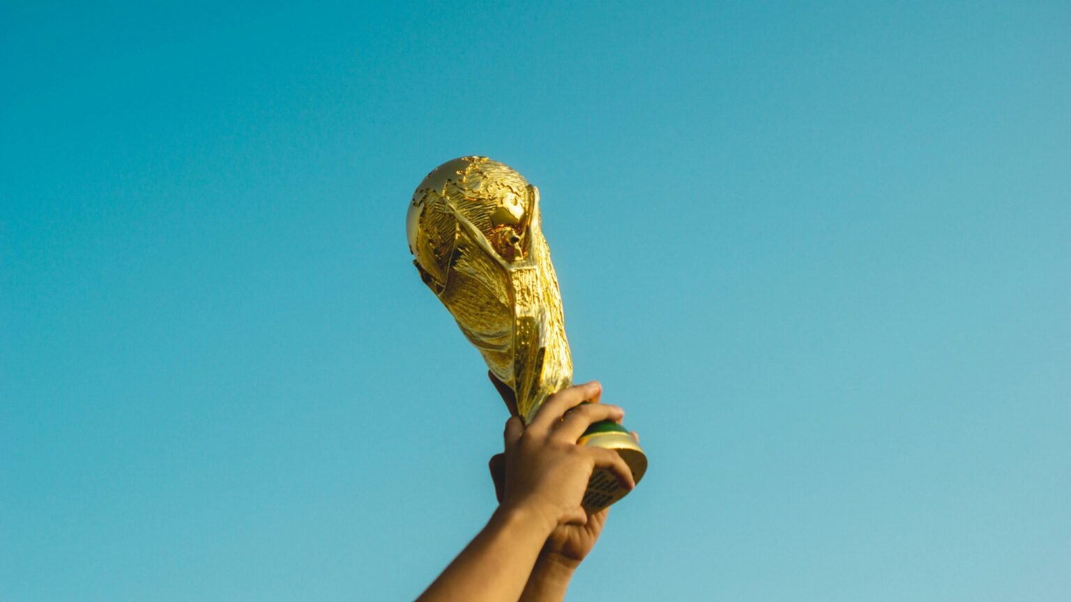 Photo: Fauzan Saari/Unsplash

				
				
				
				
				George Orwell didn’t mince his words when it came to international sporting events. In 1945, following Dynamo Moscow’s draw with Chelsea FC – a result that delighted Joseph Stalin – Orwell described such fixtures as “mimic warfare” and “orgies of hate”. Football fans will no doubt take issue with Orwell, arguing that the beautiful game is just as unifying as it is divisive and I’ll admit to a soft spot for a major tournament. But as with all things Orwell, the man has a point.
Today the 2026 World Cup begins, hosted between the USA, Canada and Mexico. Players and referees have already been denied entry to the USA in a sign that the Trump administration’s immigration policy impacts everyone. This isn’t really a free speech issue, but it speaks to a broader chill around immigration, that has also targeted people on the basis of their speech. Organisations that campaign for media freedom are worried. The Press Freedom Tracker has expressed concerns about the role of ICE agents during the tournament and how journalists may be detained for less than favourable reporting. The Committee to Protect Journalists (CPJ) have issued guidance for foreign reporters in the country too. Seeing this, a friend of mine, a former Moscow correspondent, noted that the advice was strikingly reminiscent of guidance issued during the 2018 World Cup in Vladimir Putin’s Russia.
Your average sports correspondent may not have a problem. Football is fairly safe to report on if you stick to what’s happening on the pitch. It does though become more dangerous once you probe beneath. Speak to journalists behind Football Leaks, a cross-border investigation that revealed “how agents, intermediaries and club officials are perverting sporting ethics and tax regulations to maximise their access to the riches generated from football, at the expense of the quality of the game, the development of talent and the wishes of the fans”. Getting the stories out as part of this investigation was riddled with risk. It makes sense. We know the rich and powerful abuse legal systems and professional football is a game of the rich and powerful.
Of more immediate concern are the stories beyond the fixtures, the ones that curious journalists may understandably want to pursue once on the ground in the three countries. While media freedom in Canada remains high, it’s far more fragile in the USA and even more so in Mexico. I’ve heard reports of walls being erected and banners deployed to conceal poverty and urban decay in Mexico. As the nation tries to put its best foot forward, in every sense, will they want reporters snapping away at this?
But it’s not all bad. Teachers in Mexico are protesting near the World Cup stadium in an attempt to use this sensitive moment to push through a pay rise. They may very well succeed and the president, Claudia Sheinbaum, has apparently ruled out a heavy-handed response, presumably in part concerned about the current global spotlight. This is far from the grotesque sportswashing exercise of Qatar 2022, a tournament “built on the corpses of migrant workers and the stolen wealth of the Qatari people”, and as a Qatari human rights activist wrote for us at the time.

			
			
					
				
				
				
				READ MORE