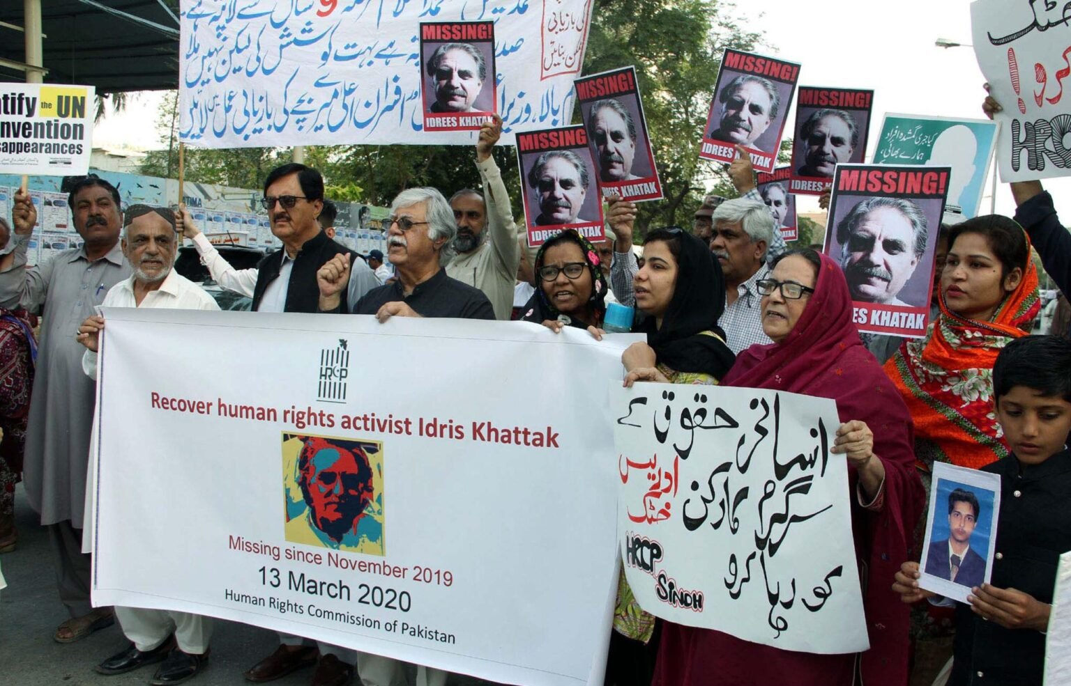 Members of Human Rights Commission of Pakistan (HRCP) protest for the recovery of missing activist Idris Khattak at Karachi press club, 2022. Photo from Pakistan Press International/Alamy

				
				
				
				
				Cambridge describes itself as a lighthouse of civilization. A cathedral of learning, a monument to thought historically positioned above the petty politics of the world. But what happens when the 21st century knocks? What happens when the modern age intrudes in the form of surveillance and threats? Cambridge’s response, as I have found out, is first to hesitate, then to turn away. Relying on the polished language of bureaucracy and neutrality, it turns a blind eye to reality and dresses up its response – its failure to respond – as policy. 
When repression crosses oceans 
I arrived at Cambridge as a researcher, with documented evidence of enforced disappearances, crimes against humanity and military executions. My family history is etched into this record of repression. My cousin Idris Khattak, a human rights researcher, was disappeared in 2019. He now sits in torture cells, a declared prisoner of conscience. The UN, Amnesty International and Freedom House have all cited his case in reports on human rights violations. But the violence I hoped to research at Cambridge did not remain theoretical for very long before becoming “transnational”.  
I was aware of the risks. In September 2022, I went to Stockholm to investigate the mysterious murder of Baloch journalist Sajid Hussain. While Hussain’s death remains shrouded in mystery, the available evidence points to the involvement of Pakistan’s intelligence services in his death. While in Sweden, I was targeted by a break-in so precise that it could only have been committed by someone who knew my movements in advance. Specific details of the break-in were only known by the police – but this deliberately concealed information was referenced in threatening messages sent to me subsequently. Being in exile, I learnt, is not the same as protection. Sometimes it is merely distance.  
I took up a place in Cambridge in the autumn of 2024. Late that year and into the next, I started to receive threatening messages containing specific information about my work, documents, and movements. Information that only state-linked actors could possibly acquire. The threats were direct and personal; designed to frighten, and also to demonstrate their reach.  
Emboldened by Cambridge’s failure to act decisively, by the end of 2025 the threats had changed in register. They were no longer veiled: I was told explicitly that I was “waiting for the bullet”. I reported the death threats – this is what they were – to both the university and the police. But nothing was done.  And then, only a few weeks ago, a new round of threats arrived. Fresh, specific, unmistakably in their hostile intent. This was no residue of an old campaign. It was active, adaptive and ongoing. 
This is what experts call transnational repression: when a state exports fear to silence its critics abroad. The phenomenon is not abstract as the name might suggest. It could be your father’s telephone number inserted into a message sent to you by a stranger. Your passport number and details recited back like an incantation. 
And Cambridge? 
When I alerted Cambridge to the issue, I did not expect the university to fight a war on my behalf. I was asking for what all institutions of learning claim to stand for: protection of the vulnerable, space for free expression and dissent. 
But Cambridge did not tell me I was safe. Rather, it responded with managerial detachment. Citing spurious contractual violations, Cambridge sought to evict me from my student accommodation. Rather than ensuring that my room was secure, they secured it from me. Instead of defending my right to research, Cambridge ejected me from what I had believed to be a place of academic freedom. They did this administratively. Neatly. Like a liability item quietly struck from a balance sheet. 
A Wolfson College spokesperson said at the time: “The College is and has been taking all steps toward resolving the situation, including ongoing conversation with the student.”  
Both John McDonnell MP and the human rights lawyer Clive Stafford Smith made representations on my behalf to the university, long before the danger became as visible as it is now. By continuing to censor my work, they warned, Cambridge would not be “managing risk” but manufacturing it. Silencing a dissident does not neutralise a threat, but rather advertises vulnerability.   
Ben Keith, my lawyer, submitted that the university’s actions were unlawful: a violation of academic freedom, and a violation of my rights under the Higher Education (Freedom of Speech) Act 2023 and Article 10 of the European Convention on Human Rights. Nevertheless, Cambridge chose to proceed. 
Concerns about my predicament have been raised by Amnesty International, Freedom House, special rapporteurs of the UN and Index on Censorship; by the National Union of Journalists; by members of parliament through an Early Day Motion; and by leading international human rights lawyers. Cambridge’s response to all was wrapped in bureaucratic obfuscation: words like “capacity”, “protocol”, “risk assessment”.   
Despite its standing in academia, Cambridge determined at precisely this moment that it could do nothing. This is not neutrality. It is impotence dressed up as alignment.  
Priyamvada Gopal, professor of postcolonial studies at Cambridge, was to have supervised my doctoral research had Cambridge not terminated it. In an email, she told me: “Cambridge University is deeply imbricated with the financial and political forces that sadly shape our society right now, and you are not wrong to sense that outside pressures have contributed to this situation.” 
In a letter to the university authorities, Professor Thomas Jeff Miley, who supervised my M.Phil. thesis, wrote: “The circumstances surrounding Roshaan’s case smell of the university bowing to pressure and being complicit in international repression of dissident voices. The department pursued a policy with Roshaan that is virtually unprecedented in my experience of over a decade and a half of teaching here at Cambridge.” He also warned of the growing perception that the handling of my case may have been influenced by external pressure. Cambridge’s response, he noted, risked reproducing the very objectives of repression – harassment, intimidation, censorship, and the diversion of a scholar’s time and energy. 
A pattern beyond one body 
My case is part of a geography of fear that now reaches across continents. Over the last few months, Pakistani dissidents in the UK and elsewhere have been attacked with alarming co-ordination. I have received death threats. Other exiles have been beaten in their homes and had their houses ransacked, their safety systematically undermined. The message is clear: distance will not protect you. This is what it means by transnational repression, when repression learns to travel. 
The danger we face is no longer theoretical. It has an address, it has victims. And it has around it a silence that is beginning to look like complicity. In a letter to Cambridge University, Stafford Smith wrote: “Where a researcher is documenting allegations of atrocity crimes and is targeted as a result, institutional choices that assist attempts to silence that research are not merely unfortunate, they raise questions of facilitative complicity.”  
Cambridge speaks the language of compassion fluently: “wellbeing frameworks”, “safeguarding reviews”, “risk protocols” and so on. But in practice, these phrases become weapons wrapped in velvet. They convert a political act – refusal to protect and support a threatened dissident, despite an ethical and legal duty to do so – into a technical one. In this new order, a dissident researcher becomes a “security complication”, a human life becomes a “risk factor”. 
Then there is the matter of China. My work cuts across both Islamabad and Beijing’s interests, given that the China-Pakistan Economic Corridor runs through Balochistan. 
China is another geo-political power whose red lines are shaping what can be safely researched, and scholarship is increasingly contorting itself around Beijing’s sensitivities.   
Cambridge is not untouched by this. In recent years, it has received tens of millions in China-linked funding, and has inaugurated partnerships such as the £200 million TusPark venture at its Science Park. Several senior academics have told me that topics that are now deemed “politically sensitive” – Uyghur persecution, for example, or China’s overseas footprint, are off-limits. Power does not merely repress. It edits. 
The university as empire, rewritten 
Once, institutions silenced dissidents with overt authority. Today, they do it by way of procedure. The effect is the same. Only the aesthetics have changed. 
The question is not what Cambridge could have done. The answer is simple. Stand with the threatened, shelter the vulnerable, protect dissent even when this is inconvenient. Especially when it is inconvenient. When a state tries to silence a scholar on one’s territory, one should stand firm and say “no”. Universities that refuse to defend the vulnerable have no right to claim that they are in the business of defending truth. 
But we refuse to leave quietly 
There is still a path back for Cambridge. But taking this requires something that seems to be unfamiliar to the institution at the moment: to choose people over power, to choose life over alignment. Cambridge needs to recall how to choose truth over the seductive quiet of compliance. The lamps of learning are being dimmed. And the ash settling on them is not a metaphor. It is real, the charred remnants of the hope once held by the students it has betrayed. 
Roshaan Khattak is a Pakistani documentary filmmaker and activist living in exile in the UK. His work researches human rights issues in Pakistan, specifically “enforced disappearances and related alleged abuses in Pakistan’s Balochistan province”.

 
A timeline of Transnational Repression
 
Pakistan has a history of intimidating dissidents living beyond its borders – a phenomenon known as transnational repression (TNR). At least two, Karima Baloch and Sajid Hussain have been killed, and several have been injured in targeted attacks in the UK.
September 2024 – Khattak registers for an M.Phil in sociology at Wolfson College Cambridge, expecting to proceed after this to research for his Ph.D., exploring human rights violations in Balochistan. Khattak has confirmed to Index that he discussed TNR and the politically sensitive nature of his research with the university before taking up his place. Also, his understanding was that his progression to the Ph.D. programme depended solely on successfully completing the M.Phil.
30 November 2024 – Khattak organises an online solidarity event in support of his cousin, Idris Khattak. A one-time Amnesty and Human Rights Watch researcher, Khattak is currently serving a 14-year sentence in Pakistan, after being tried by a military court on charges of espionage.
3 December 2024 – Residents of Khattak’s postgraduate accommodation hall at Cambridge report two “strange blasts” in the building, causing a partial electricity outage. Khattak states that no concrete follow up steps were carried out by the university, despite his concerns about his safety.
Soon after this, Wolfson College terminates Khattak’s accommodation contract, citing residency violations on his part. Khattak disputes the college’s claims. Even though Khattak is out of the country at the time, the college change the locks to his room and power down his computer – which contains sensitive information relating to his research.
21 December 2024 – Khattak receives a specific and detailed threat via X. On reporting it to the college, he is told to refer the matter to the police. Initially, the police tell him that because he is outside the country, it is outside their jurisdiction. Later, on being advised of the broader context of TNR and Cambridge, he is told that no action could be taken because the threshold warranting an investigation has not been met.
Khattak states that a total of 15 requests to meet with college officials were rebuffed, with meetings cancelled “at the last minute” on 4 occasions.
Under pressure from civil rights organisations and Khattak, Wolfson College reverse the decision to terminate Khattak’s accommodation.
February 2025 – Khattak is informed that he would not be allowed to progress to the Ph.D. programme after completing his M.Phil. in December 2025. No reason is given.
June 2025 – Khattak’s accommodation contract is terminated for a second time, even though Khattak remains a registered student at Wolfson College until the end of December 2025.
1 August 2025 – The Higher Education (Freedom of Speech) Act 2023 (HEFSA) comes into effect. Amongst other things, the act establishes a duty for relevant bodies (including universities) to maintain a clear code of practice on matters relating to free speech and academic research.
7 October 2025 – an open letter penned by a cross-section of interested parties (including Index) asks Cambridge University to review Khattak’s case.
17 November 2025 – Khattak reports, once again, the death threats to the university. In line with HEFSA, the university has a statutory duty to respond accordingly.
17 December 2025 – Not having received a response to his report, Khattak writes to his personal tutor at Wolfson College, setting out the facts and the university’s failure to respond.
In a letter dated 17 March 2026, Dr Thomas Jeffrey Miley, associate professor of sociology at Cambridge and Khattak’s proposed PhD supervisor, wrote:
“Roshaan is an exceptionally strong scholar. He is one of the strongest students I have taught and supervised. His work is original, intellectually ambitious, politically and sociologically important, and pursued with unusual seriousness, independence and courage.” The letter continued:
“In my view, the university had, and continues to have, responsibilities toward Roshaan in light of the risks attached to his lawful academic work…where a student has reported threats related to lawful research in the post-August 2025 regulatory context, the University cannot properly treat the matter as irrelevant to decisions that affect whether that research can continue.”
Of the wider implications of Cambridge’s treatment of Khattak, Miley added:
“I must also record my distress at the manner in which [Khattak] has been treated over the past year. He was twice required to leave accommodation by Wolfson College using flawed pretexts and at a very short notice. As I understand it, last time he suffered [the] loss of all his belongings as a result. There were also last-minute disruptions surrounding the MPhil that, from an academic point of view, appeared wholly disproportionate and very difficult to reconcile with ordinary practice.”

			
			
					
				
				
				
				READ MORE