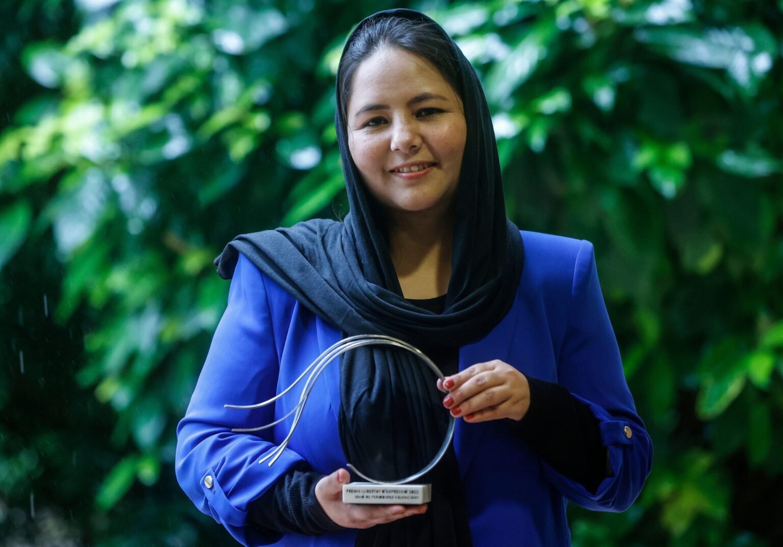 Afghan journalist and director of Rukhshana Media, Zahra Joya. Photo: Associated Press / Alamy Stock Photo

				
				
				
				
				Nearly five years after the Taliban took control of her country and she fled Kabul, Afghan journalist Zahra Joya is telling her story. Her book The Vanishing Girl of Kabul, written with British-American journalist Amie Ferris-Rotman, is a mirror not just for Joya’s life, but for millions of other Afghan women and girls, who she describes as currently living in “home prisons”.
The book tells the story of the Taliban’s brutal silencing of women and Joya’s own life of resistance. How she pretended to be a boy in the 1990s so she could go to school. How her family quickly packed up her grandfather’s handwritten Persian epic while the Taliban raided local villages for banned books. And how she feared for her life when the Taliban returned five years ago. Being a Hazara woman  – Hazaras are a persecuted minority in Afghanistan – she grew up with extreme violence levelled at her people.
“It was important for me to record it, for people to understand, for the next generation and the history of Afghanistan,” Joya told Index.
The day before the Taliban returned, she recounts in her book, she had the freedom to go the beauty salon. The next day offered a stark contrast.
“Everything collapsed, including my own freedom,” she said.
As the Taliban drew further into Kabul, she and her colleagues at the women-led publication which she had founded, Rukhshana Media, continued reporting. As Joya saw it, she was standing up for her rights and for freedom of expression, and was making sure the world knew about what was unfolding.
“We never imagined that the Taliban would come to power so quickly, and everything would vanish very soon. We never thought that one day journalism would be a huge risk for the whole team,” she said.
Joya had set up Rukhshana Media only a year before, and even then she was doing something courageous. In Afghanistan’s patriarchal society, the media space was dominated by men, who often held leadership positions.
Now, Joya continues to run Rukhshana Media from London. Her journalists across Afghanistan work underground, protecting their identities by remaining anonymous and never meeting each other. Joya feels she has a heavy responsibility on her shoulders.
Just before she spoke with Index, she received a voice message from one of her journalists describing how she wakes up every morning afraid of what she is going to lose on that particular day. Women and girls are banned from secondary and university education, and most jobs are closed to them. They must cover their bodies completely and even visiting a doctor requires a male chaperone.
“The reality of Afghanistan under the Taliban regime is a complete gender apartheid system,” Joya said.
Since she’s been in the UK, Joya has received a vast number of direct messages on social media from Taliban supporters, threatening her directly for her work and sending her videos of sexual abuse.
But she has received supportive messages too. Now, she hopes readers of her book will reflect on the story, perhaps even take a photo of themselves with it and send her a message.
Writing about her own life has been a difficult experience, and she has had to be careful around details of her relatives who are still in Afghanistan. But Joya said that remaining silent is not a solution.
“It is part of my struggle against the misogyny, discrimination and injustice that is ongoing in Afghanistan,” she said. “The Vanishing Girl of Kabul. Maybe it’s me because I have had to disappear many times and find myself again, but I feel like she could just as easily be the millions of women of Afghanistan.”
The Vanishing Girl of Kabul was published by Robinson on 23 July 2026

			
			
					
				
				
				
				READ MORE