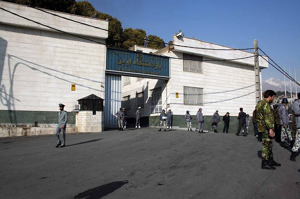 Evin Prison, Iran. Photo: Ehsan Iran/CC BY-SA 2.0
The renewed bombing of Iran has done a darn good job of diverting attention away from the Iranian government’s own utterly disturbing record when it comes to freedom of expression. So brutal is the regime there that it can sometimes feel like if you blink, you’ll miss another atrocity, like the execution of a protester this week. Mohammad Amini Dehaghani was accused of setting fire to a governor’s office in Isfahan, alongside distributing anti-government propaganda. For this he was hanged. I only found out about his death after it happened, though I did hear of some 12 more prisoners who are at imminent risk of execution following Iran’s Supreme Court upholding their death sentences.
The country has a playbook. The deaths of four members of the paramilitary during January’s protests have been pinned on these 12 people, and others too. The evidence is typically flimsy, the proceedings opaque, independent legal representation denied, and convictions rest on confessions that have apparently been extracted under torture. Perhaps the people were involved in killings, if these killings even happened, perhaps not. In Iran the truth doesn’t matter. It isn’t about justice (which frankly should never be meted out through capital punishment anyway). It’s about making the cost of speaking up so great that no one does.
The total disregard for any due process has defined the case of British husband and wife Lindsay and Craig Foreman too. In February the couple, who were arrested while travelling in the country, were each sentenced to 10 years in jail on accusations of espionage. They’ve denied these charges. This week Craig had two years added to his sentence, according to family members, all because he spoke to the media. Like others in Iran, Craig has been denied a lawyer, a translator and any opportunity to defend himself.
Index has not done anything on the case of the Foremans to date because it wasn’t about freedom of expression. The couple were not arrested because of what they said, but instead because of where they were. They are not dissidents. Those facts remain. Still, Craig being punished for talking to the press is a speech issue. The authorities either don’t want him speaking out, or the media reporting on the case, or both. All of which is outrageous.
A crackdown is also happening across Tehran’s campuses. Students are being summoned for disciplinary hearings, they’re receiving threatening phone calls, they’re having access blocked to academic portals and in more extreme cases they’re being expelled from universities. According to a report released on the Telegram channel Al-Zahra Twitter at the weekend, a large number of the actions against students relate to more everyday grievances that students are protesting, not big political demands. All of which highlights how perilous it is to confront the powerful in Iran.
READ MORE Evin Prison, Iran. Photo: Ehsan Iran/CC BY-SA 2.0
The renewed bombing of Iran has done a darn good job of diverting attention away from the Iranian government’s own utterly disturbing record when it comes to freedom of expression. So brutal is the regime there that it can sometimes feel like if you blink, you’ll miss another atrocity, like the execution of a protester this week. Mohammad Amini Dehaghani was accused of setting fire to a governor’s office in Isfahan, alongside distributing anti-government propaganda. For this he was hanged. I only found out about his death after it happened, though I did hear of some 12 more prisoners who are at imminent risk of execution following Iran’s Supreme Court upholding their death sentences.
The country has a playbook. The deaths of four members of the paramilitary during January’s protests have been pinned on these 12 people, and others too. The evidence is typically flimsy, the proceedings opaque, independent legal representation denied, and convictions rest on confessions that have apparently been extracted under torture. Perhaps the people were involved in killings, if these killings even happened, perhaps not. In Iran the truth doesn’t matter. It isn’t about justice (which frankly should never be meted out through capital punishment anyway). It’s about making the cost of speaking up so great that no one does.
The total disregard for any due process has defined the case of British husband and wife Lindsay and Craig Foreman too. In February the couple, who were arrested while travelling in the country, were each sentenced to 10 years in jail on accusations of espionage. They’ve denied these charges. This week Craig had two years added to his sentence, according to family members, all because he spoke to the media. Like others in Iran, Craig has been denied a lawyer, a translator and any opportunity to defend himself.
Index has not done anything on the case of the Foremans to date because it wasn’t about freedom of expression. The couple were not arrested because of what they said, but instead because of where they were. They are not dissidents. Those facts remain. Still, Craig being punished for talking to the press is a speech issue. The authorities either don’t want him speaking out, or the media reporting on the case, or both. All of which is outrageous.
A crackdown is also happening across Tehran’s campuses. Students are being summoned for disciplinary hearings, they’re receiving threatening phone calls, they’re having access blocked to academic portals and in more extreme cases they’re being expelled from universities. According to a report released on the Telegram channel Al-Zahra Twitter at the weekend, a large number of the actions against students relate to more everyday grievances that students are protesting, not big political demands. All of which highlights how perilous it is to confront the powerful in Iran.
READ MORE