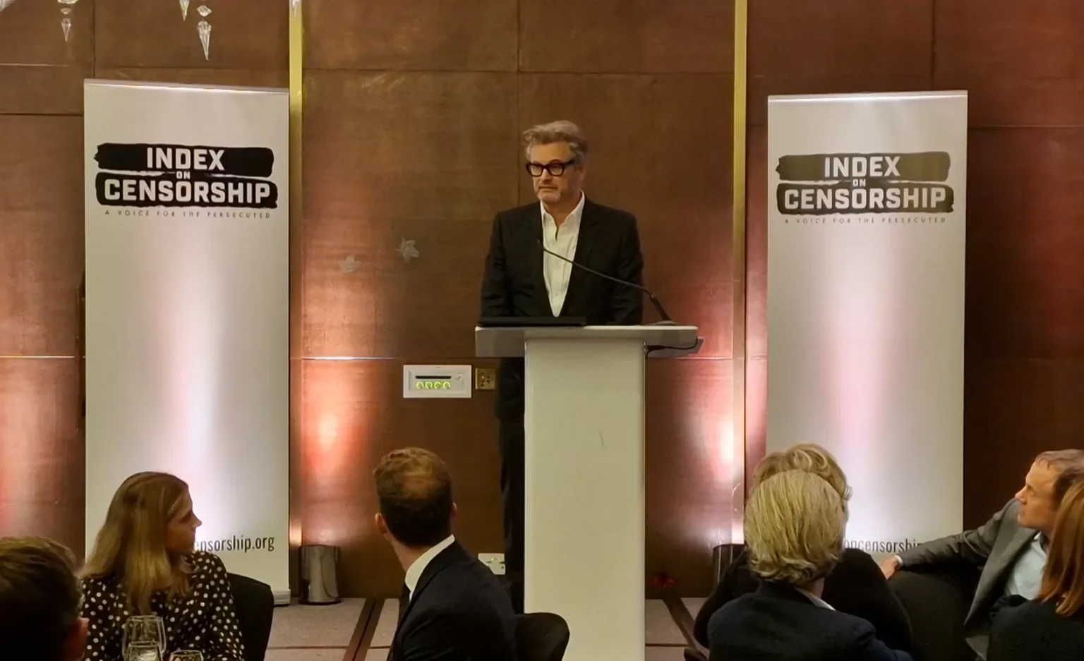 Colin Firth accepts the Trustees Award for Sir Salman Rushdie at the 2023 Freedom of Expression Awards

				
				
				
				
				Index on Censorship is seeking an organised, creative and proactive Events & Partnerships Manager to lead the delivery of our public events programme, support our membership community and help maintain strong relationships with partners, funders and supporters.
This is a practical, outward-facing role for someone who enjoys making things happen. You will work closely with colleagues across the organisation, including the CEO and programme teams, will be highly organised, will be comfortable managing multiple projects and confident working with a wide range of external stakeholders.
Key responsibilities
– Lead the planning and delivery of Index’s events programme, ensuring events are well organised, impactful and aligned with organisational priorities.
– Manage the delivery of our flagship annual Freedom of Expression Awards, including creation of materials (video and text) as part of the event.
– Coordinate Index’s involvement in Banned Books Week and other public-facing campaigns and events related to book challenges.
– Support the development of new event partnerships and sponsorship opportunities.
– Build and maintain positive relationships with key partners, funders, sponsors, supporters and the media.
– Coordinate grant reporting and ensure funding requirements and deadlines are met.
– Support growth and development of Index’s membership programme, including organising activities and events that help members feel connected to Index’s work.
– Represent Index at events, meetings and relevant sector activities.
– Build relationships across the arts, media, publishing, human rights and civil society sectors.
Person specification
Essential:
– Experience planning and delivering events or public programmes from concept through to completion.
– Strong organisational and project management skills, with the ability to manage multiple priorities.
– Experience building and maintaining relationships with external stakeholders.
– Excellent written and verbal communication skills.
– Ability to manage budgets, timelines and administrative processes.
– Strong attention to detail and the ability to deliver high-quality work independently.
– Commitment to freedom of expression and Index’s mission.
Desirable:
– Experience delivering high-profile events involving speakers, partners or sponsors.
– Experience with software/tools for slides and video editing assistance.
– Experience working in the arts, media, publishing, charity or human rights sectors.
– Familiarity with contact/supporter databases.
– Experience managing relationships with funders.
– Experience coordinating membership, supporter or community engagement programmes.
Hours: Full time, contract.
Salary: £33,000–£38,000 dependent on experience
Location: Remote but with regular travel to London
Index is a small and ambitious organisation that values diversity. We are committed to equal opportunities and welcome all applicants regardless of ethnic origin, national origin, gender, gender identity, race, colour, religious beliefs, disability, sexual orientation, age or marital status.
To apply please send a cover letter with your CV by Monday 31st August 2026 to [email protected]

			
			
					
				
				
				
				READ MORE