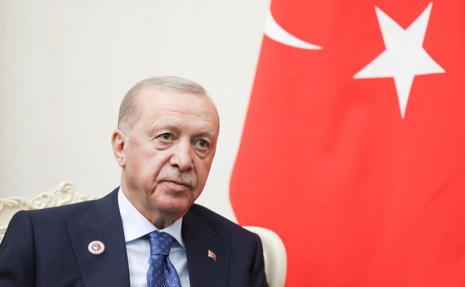 Turkey under Recep Tayyip Erdoğan has already considers queer lifestyles an impediment to its goals

				
				
				
				
				
			
				
				
				
				
				
				
				
				
				
				
				
				
				
				
				
				
				
				This has been a chilling week for Turkey’s LGBTQ+ communities, perhaps the most unsettling in many years, as police raids against their members sent shockwaves among the country’s marginalised, precarious but well-connected queer groups.  
Turkish police have detained multiple individuals from LGBTQ+ rights organisations across Turkey’s 15 provinces, conducting raids on queer association headquarters, confiscating documents from activists, blocking access to websites and social media accounts. 
The coordinated raids surprised some, as Turkey has never legally banned homosexuality from Ottoman times onward, but operations, conducted under the government-branded “My Family is Safe” initiative, began on 12 September. An Istanbul court blocked access to numerous websites and social media accounts belonging to LGBTQ+ organisations and activists. 
Over five days, courts launched investigations against at least 116 individuals, nine associations, and thirteen businesses. At least 82 were formally arrested as a result of the raids, 25 of whom are LGBTQ+ activists or have formal connections to queer associations.
In January 2025, the Turkish government announced 2025 would be “the year of the family”. 
Throughout 2025, there were widely shared fears among Turkey’s LGBTQ+ communities of an operation against queer associations and activists. Yet Ankara didn’t take action, despite heightened government rhetoric against “degenerates” and the “LGBT imposition” and “desexualisation policies of globalists”.
Then, in May 2025, the government announced an extension of the project, branding 2026-2035 as the “decade of family and population”. 
Ankara considers queer lifestyles an impediment to population growth and promised to establish a “digital family shield” to identify, assess, and prevent “harmful elements” that pose a threat to “the health of the Turkish family”. 
Instead of passing a law that legally banned queer relationships, the government launched a wave of police operations, branding the effort “My Family is Safe”.
“This operation is taking place now because the optimal conditions for carrying it out have been cultivated over the years,” Seçil Epik, founder of Turkish queer publisher Umami, told Index. “For us activists, this comes as no surprise.”

Ankara considers queer lifestyles an impediment to population growth

Over the past week, the government blocked the website of Kaos GL, Turkey’s first legal LGBTQ+ association, founded in 1994 and granted legal status in 2005. Editors quickly changed its web address to circumvent the ban.  
“We don’t have any clear picture of why the operation has begun this week,” Yıldız Tar, editor of Kaos GL, told Index. “It was more like an escalated process that started in 2015 with the attack on pride marches. Now they’re directly targeting LGBTQI organisations, activists and ordinary LGBTQ+ individuals only because they are queer.”
Tar was taken into custody on June 23 and sent to Sincan Prison two days later on allegations of “membership in a terrorist organisation” in the days leading up to the Nato Summit in Ankara. 
After a month in detention, authorities released him alongside several other individuals, including academics. 
Tar had been previously detained on similar allegations in February 2025 and released in May 2025. 
“They tried to criminalise homosexuality by passing a law in parliament, but they couldn’t, due to our efforts. Now they are trying to act as if that law passed,” says Tar.
Ankara also banned access to ÜniKuir’s news site, the Pink Life (Pembe Hayat) Association, the Youth LGBTI+ Association, Lambdaistanbul, the Muamma LGBTI+ Association, and other queer publications.
The ban extended to the social media accounts of actor and trans rights activist Seyhan Arman, and theatre actor and LGBTQ+ activist Zeynep Esmeray Özadikti.
On September 13, a day after the internet bans, police in Ankara raided Kaos GL’s office in the Turkish capital, as well as the apartments of Kaos GL members who served on the association’s supervisory boards.

“They are trying to act as if that law passed”

			
				
				
				
				
				Kaos GL reported that more than ten LGBTQ+ activists were detained as part of this investigation, led by the Ankara Chief Public Prosecutor’s Office’s Cybercrimes Bureau. 
The Kaos GL raid was based on allegations of “obscenity”, an offence defined under Article 226 of the Turkish Penal Code (TCK), alongside alleged violations of the Law on Associations. 
The Ankara Chief Public Prosecutor’s Office alleged that “posts containing obscenity” were shared on Kaos GL’s social media accounts in a “manner accessible to children.” 
Turkish police and gendarmerie also carried out operations at numerous addresses in Istanbul, targeting queer spaces, like nightclubs and bathhouses, in Beyoğlu and Şişli districts.
On 16 September, eight people, five of whom are trans women, were formally arrested, including several Kaos GL board members and the investigative journalist Tuğba Tekerek. 
While in custody, Tekerek sent a message to the public: “The ‘lottery’ hit me this time. In 2024, I had traveled to Georgia before the elections and produced various news reports for several outlets. Among them, I had also filed a commissioned story for the Kaos GL news site.” 
Tekerek said she was charged with “administering Kaos GL’s Instagram account”, which she said had “absolutely no basis in fact. I simply produced a news report as part of my journalism work. The truth will come out sooner or later.” 
Authorities also organised raids in Mersin. The Mersin Chief Public Prosecutor’s Office ordered the detention of individuals who allegedly produced and disseminated “obscene content on social media”.

“This sweeping crackdown, in which scores of people have been arrested, has nothing to do with protecting families”

As part of the investigation, a Mersin court moved to shut down the “Muamma LGBT Association” and the “Mersin 7 Colors LGBT Association,” both operating in central Mersin.
The latest raids drew a strong international reaction. The European Commission said stigmatisation and discrimination run counter to EU values. Council of Europe Human Rights Commissioner Michael O’Flaherty emphasised that explanations based on “family values” and the “protection of children” couldn’t justify restricting human rights. 
International rights organisations, led by Ilga-Europe, characterised the operations as a “coordinated attack”.
“This sweeping crackdown, in which scores of people have been arrested, has nothing to do with protecting families and everything to do with further harming and stigmatising a community that has battled decades of discrimination and intimidation,” said Amnesty International’s Esther Major, calling for the release of those detained. 
Amidst the backlash, a Turkish court blocked access to social media accounts of Amnesty’s Turkish branch, alongside the leftist daily Evrensel, Media and Law Studies Association (MLSA), and Academics for Peace, among others. 
At the time of writing, an Amnesty International spokesperson said they had not received any official notification regarding the decision. Still, they noted that as of September 14, their X account could not be accessed from within Turkey.
Local reaction was similarly vocal. MPs from opposition parties condemned the operations. 
Several queer and feminist groups prepared to deliver a statement about the raids outside Istanbul’s Çağlayan Courthouse on 15 September. 
But when the crowd gathered in front of the courthouse around noon, the police told them to disperse before detaining 106 individuals. 
Among those detained were Birgün newspaper reporter Sarya Toprak and Şener Azak, who works for Germany’s ARD network. 
“We have reached this point as a result of the state’s years-long campaign to target and criminalise LGBTI+ individuals using all available media channels,” said Epik, the publisher. “LGBTI+ people in Turkey are anxious and fearful, and their very existence is on the verge of being outlawed, yet—as always—they continue to resist.” 
			
			
				
				
				
				
			
				
				
					
	
	
			
			
					
				
				
				
				READ MORE