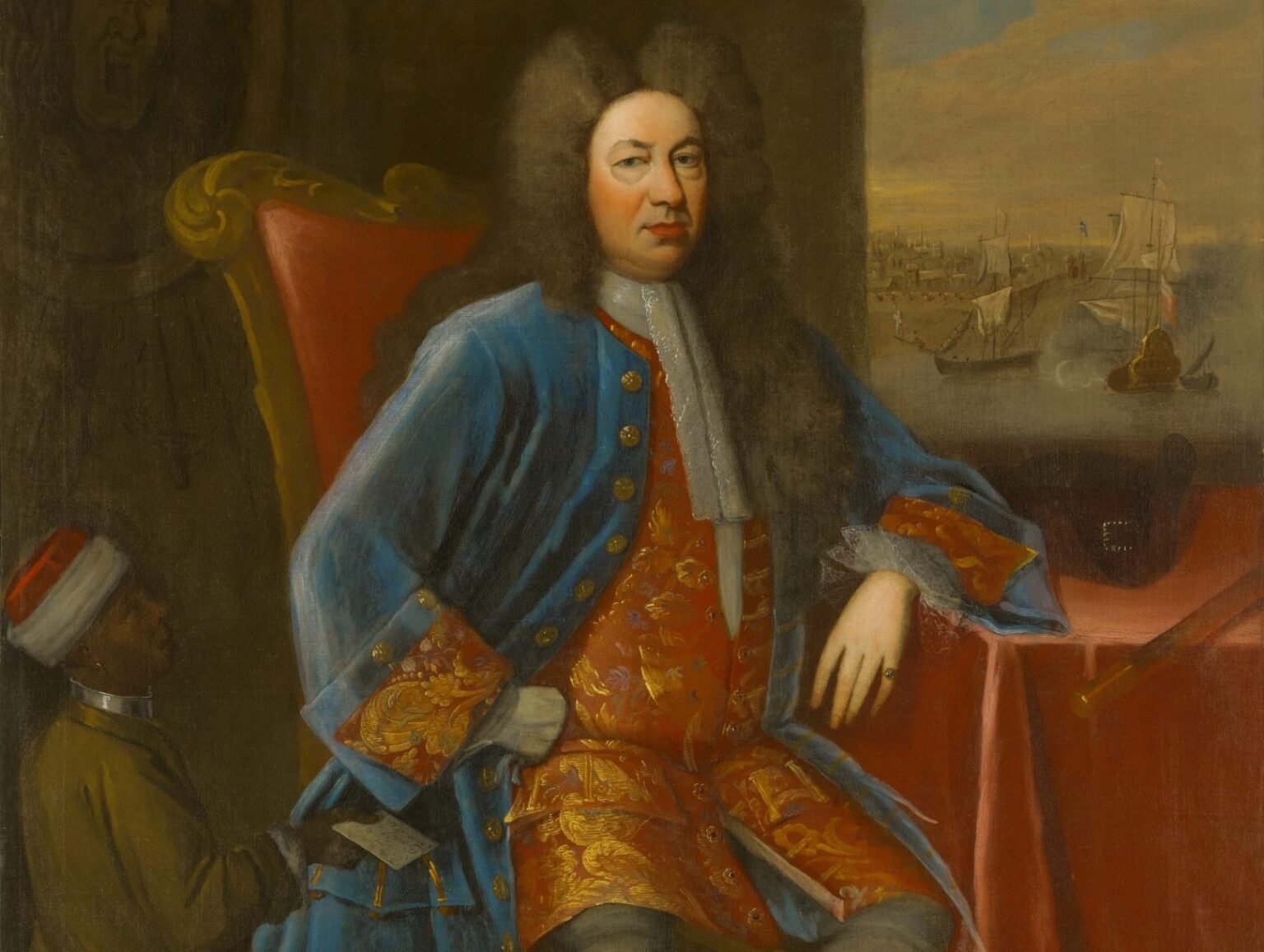Painting of trader Elihu Yale

				
				
				
				
				
			
				
				
				
				
				
				
				
				
				
				
				
				
				
				
				
				
				
				One bright spring day in early April 2026, I visited Leeds Castle in Kent to see its dog collar museum. Of the 130 “rare and valuable collars” in the museum, about 60 had been collected by John Hunt, a historian and antiquarian, and later gifted to the castle by his wife Gertrude in 1977. A further 70 had been acquired by “purchase and donation”. According to the Leeds Castle website, its collection of historic collars, many dating back to the 17th and 18th centuries “was the largest of its kind on public display anywhere in the world”.
Perhaps – if the exhibits were actually dog collars. But as an historian of slavery, my suspicion was that at least some of the items that I had seen on the website were not dog collars at all, but rather collars once worn by enslaved Black and Indian people in Britain as a mark of their servitude. Photographs of exhibits at the museum revealed large collars which match depictions of these slave collars in paintings dating to the late 17th and early 18th century, and I was keen to compare the two first-hand.
But I was thwarted. Despite the website’s pronouncement that “Leeds Castle’s Dog Collar Museum is open daily,” the museum had been closed. It seems that at some point the curatorial team at Leeds Castle discovered that their exhibits were not all dog collars, and quietly shut the museum. So quietly they forgot to update the castle’s website. There were good intentions behind this, no doubt. But it was also an act of historical censorship, even if inadvertent – part of a pattern of rewriting Britain’s role in the slave trade, a tendency that has become more pronounced over the past few years.
Between 1675 and 1807 Britain was the main importer of slaves to the New World from Africa. After 1807, when Parliament passed the Abolition of the Slave Trade Act, Britain not only ended its involvement in the international slave trade but actively worked to combat it. Nevertheless, its participation in the slave trade is part of British history. How best to engage with this distasteful part of the story is a complex issue, one that British museums and National Trust sites have a duty to consider carefully.

My suspicion was that at least some of the items that I had seen on the website were not dog collars at all

As historians undertake deeper research into the topic, the extent of Britain’s investment in slavery, both cultural and material, is becoming evident. Suppressing artefacts, which provide evidence distorts history.
Silver slave collars are crucial artefacts which speak to that difficult legacy. The Yale Center for British Art in New Haven, Connecticut owns four portraits of Elihu Yale, dating to between 1710 and 1720. Yale, a wealthy merchant and British colonial administrator, was an early donor to the university now named after him. One of these, painted by the Briton James Worsdale and an imposing 2.3 metres tall, is described as Elihu Yale with his Servant. The portrait, clearly intended to depict Yale as a man of substance, shows him being attended to by a Black slave wearing a silver collar around his neck. Until 2007, it hung in the Yale Corporation Room in the university’s Woodbridge Hall, where the Yale Board of Trustees met to decide campus policy, until a student pointed out the incongruity of the painting on social media: not because it existed, but because of how it existed, benignly watching over meetings of the university’s trustees.
John Marciari, a curator for the Yale Center for British Art at the time, acknowledged to the local newspaper, the Hartford Courant, that he knew of many other similar paintings, but that these were normally kept off display. Curators at some museums, he continued, “have since painted over the collars to make the art more palatable.” The paintings of Elihu Yale date to when he was part of the circle of courtiers surrounding Queen Anne. They can be viewed on the Center’s website, along with a discussion of the paintings’ historical provenance and context.
Slave collars were a real thing at the time and archival evidence testifies to their ubiquity in England itself. Take, for example, an advertisement in popular newspaper The London Postman, from 17 September 1706: “Runaway from his Master about a fortnight since, a lusty Negro Boy about 18 years of age… Had about his neck a silver collar engraved Captain Thomas Mitchel’s Negro, Living Curators at some museums, he continued in Griffin Street in Shadwell.”
			
				
				
				
				
				
			An exhibit showing collars at Leeds Castle (Steve Vidler/Alamy)

				
				
				
				
				Leeds Castle, to be fair, is an unlikely location for a historical reckoning. On the Easter weekend of my visit to the “dog collar museum”, I was greeted on the path towards the castle by a carved wooden dragon, pretend mermaids and other magical creatures for children to discover. A day at the castle is clearly intended to be a fun day out for children and adults alike. Why force happy families to engage with such disturbing things?
But this question underscores an important point: careful thought is a basic prerequisite for the display of such artefacts. For some time, the National Trust (NT) has been engulfed in controversy about the best way to display – or not – such artefacts forming part of the collections in many of its houses. The NT’s collection at Dyrham Park near Bristol, for example, includes a pair of stands that display Black men wearing gold collars holding scallops that serve as side tables. These were given to William Blathwayt in 1700 by his uncle, Thomas Povey. Both had been administrators for empire, with Blathwayt serving six kings and queens over almost 50 years.

Leeds Castle, to be fair, is an unlikely location for a historical reckoning

The curators at Dyrham Park have approached the issue thoughtfully. In a series of introductory exhibits that visitors encounter before entering the house, they frame Blathwayt’s involvement in empire and in slavery carefully, inviting the observer to acknowledge complicity in a deeply problematic and exploitative system. Then before entering the room with the side tables, visitors find a warning sign providing context for what awaits them.
By way of contrast, the same stands also appear on the NT’s website along with the rest of the Dyrham Park collection. The item was once listed as “Nubian Slaves” and “Blackamoor Stands” and is now blandly described as “a pair of giltwood and polychrome stands”; here, there is no discussion of the wider context that the stools are a part of.
Dyrham Park stands out for the willingness of its curators to confront this difficult past. Elsewhere, censorship by omission is far more commonplace. Indeed, sometimes this is done in the name of anti-racial history. Some Dutch museums, for instance, seem uncomfortable with any racially descriptive words such as “negro”. In 2015, a painting on the website of the RKD Nederlands Institute for Art History by Herman van der Mijn was entitled Portrait of a Lady with a Negro Servant; now it is just Portrait of an Unknown Woman, with a Servant. Dated about 1720, the Black “servant” was wearing a silver collar, marking him as a slave. Like painting over the silver collars in other works, the renaming of this painting to exclude racial signifiers, which makes it more difficult to be found and to be seen, is again a way of censoring an uncomfortable past.
Rather than conceal the existence of these silver collars, museums and other repositories of history have a duty to reckon with the past in meaningful ways. We must see the evidence in order to fully understand the battles fought and costs paid to get rid of such a system. To comprehend how the past continues to shape the present – not only for the descendants of those enslaved in Britain’s empire but for all of us – we cannot and should not censor these historical memories. Museums need to explain to the visitor why it is necessary to engage with such material and why it still disturbs.
Perhaps it all comes down to the purpose of museums. Are they supposed to be places that are just a fun day out for families, warming the blood with patriotic ardour? Or can they also be places that help us learn and make us think, that educate us about the past in order for us to make better decisions about the future? Here in the USA, as recently as 30 years ago one could go to Charleston in South Carolina and have little idea that slavery was once pervasive there. The one place that did promise some evidence, the site of the former slave market, was closed to the public. While there and elsewhere across the US, prominent museums have opened to address this history, their interpretations are now directly threatened by the Trump administration.
These silver collars and their history, are a part of British history too. Morgan Godwyn, an English minister who had served in Virginia and Barbados wrote in 1682 that “Tho but a few were concerned in this horrid Fact” of slavery in Barbados “yet our whole Nation are guilty”. Perhaps he put it too strongly. But slavery did not just stay safely in the colonies. The NT’s 2020 interim report, Connections between Colonialism and Properties, now in the Care of the National Trust, stating that slavery needs to be more carefully acknowledged at Britain’s historic sites, was exactly right.

These silver collars and their history, are a part of British history 

In response to an email query I sent after my visit, Jo Wiltcher, heritage and engagement director at Leeds Castle, confirmed that the dog collar exhibits were completely closed “following a leak in one of the rooms” in December 2022. When the exhibition was partially reopened, the new display only included a few of the collars. In response to my specific query stating that, “I’ve been working on slave collars for more than a decade (part of a much bigger book) and the online pictures indicated to me that some of the collars might actually have once been used for that purpose,” Wiltcher said: “We are aware of, and are actively working on, [a presentation strategy] behind the scenes.” She further stated that researchers could access the collars by special permission.
I suspect that their awareness about the problematic provenance of the collars was sparked by the Guardian’s 2021 coverage of an exhibit at Amsterdam’s Rijksmuseum. As Valika Smeulders, the curator for an exhibit in 2021 put it, with regard to a Dutch silver collar dated 1689: “For the longest time people have not wanted to come to terms with the meaning of those collars … they were always described as being dog collars, but if you look at the paintings, the ones wearing those collars are never the dogs, they are the men.”
My best guess is that when Leeds Castle realised what they actually possessed, their solution was to quietly, without fanfare, close the dog collar museum, leaving only a dozen collars behind in two small glass display cases in an otherwise empty room. Ironically, this work of erasure is incomplete. Leeds Castle’s website still has a page dedicated to the dog collar museum, enthusiastically describing its collection of “130 rare and valuable collars … which date from the 15th, 16th and 17th centuries”.
Affording researchers access is welcome. But it does not fully address the larger issue of setting out the context that led to the existence of these disturbing collars. If Leeds Castle choose not to display them, they should loan them to another museum. Honest curation is certainly possible to do: to frame these artefacts around the complex issues at stake, to show the real bonds and chains, and the structural legal and social system that was racial slavery. Censoring history is not the answer. More generally, the fact that a dog collar museum was open for 50 years with artefacts that were in many cases likely not meant for dogs – that, in fact, likely intended for humans – raises profound questions about how censorship can work as much by omission as by commission. Because of this omission, a difficult history has been hiding all this time in plain sight.
			
			
				
				
				
				
			
				
				
					
	
	
			
			
					
				
				
				
				READ MORE